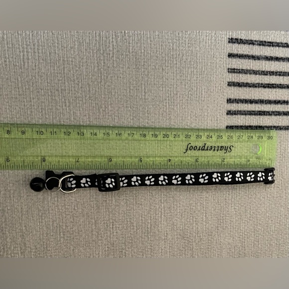 Collar with White Paw Print Pattern and Matching Bell and Buckle - Picture 7 of 15
